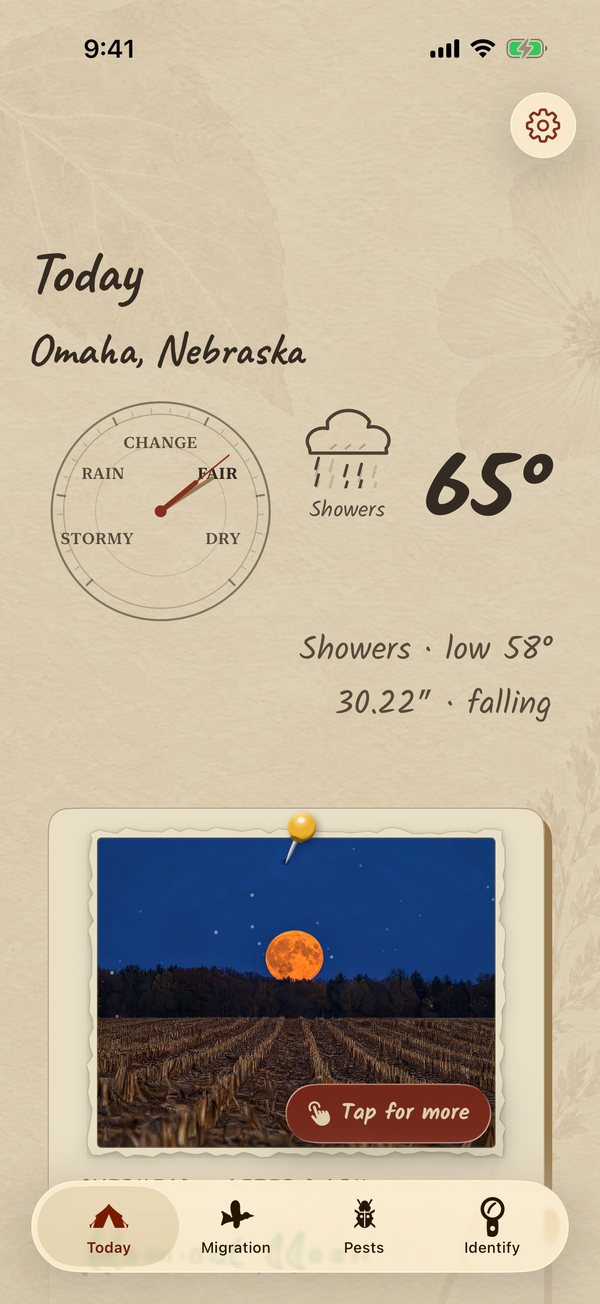 The Today screen for Omaha, Nebraska: a barometer, showers and 65 degrees, over a photograph of the Harvest Moon